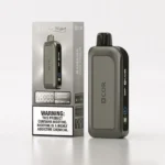 XCOR DUBAI NIGHT 28000 PUFFS w ciemnym, nastrojowym otoczeniu.