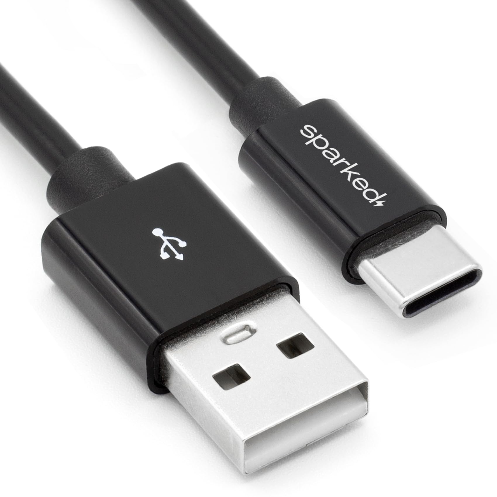 E-papieros podłączony kablem USB-C do laptopa lub zasilacza, z widoczną ikoną niskiego poziomu baterii lub wskaźnikiem ładowania.
